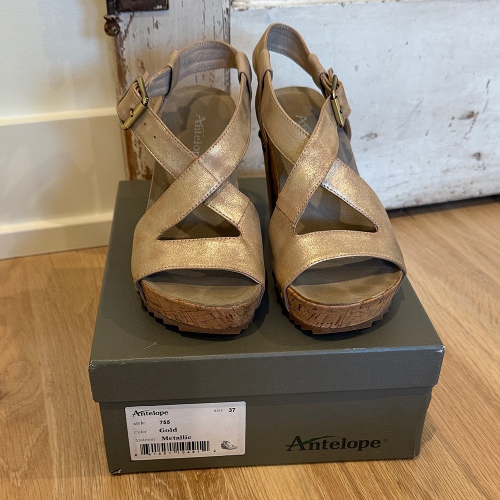 Antelope Shimmering Gold Platform Sandals
